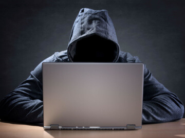 theme-cybercrime-hacker-steals-data-from-laptop_photo